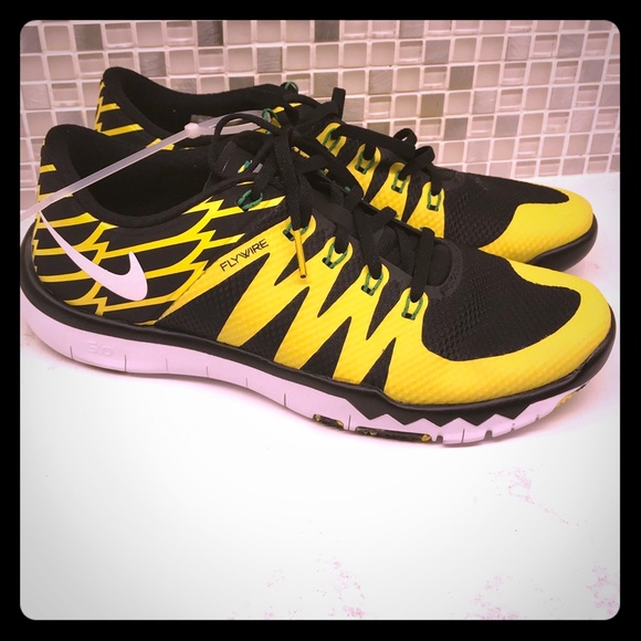 yellow and black gym shoes